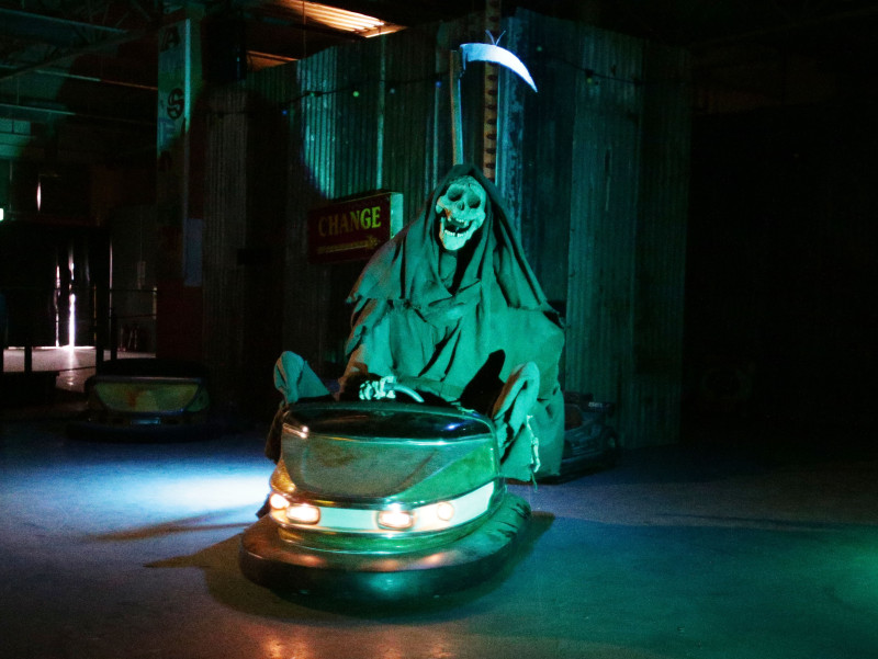 The grim reaper rides the dodgems at Dismaland - Bemusement Park, Banksy's biggest show to date, in Western-super-Mare, Somerset.